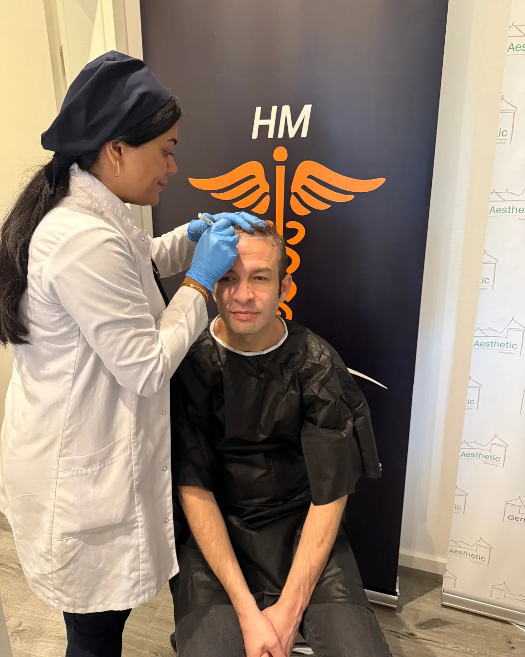 Doctor at work at HM Hair Transplantation Helmond